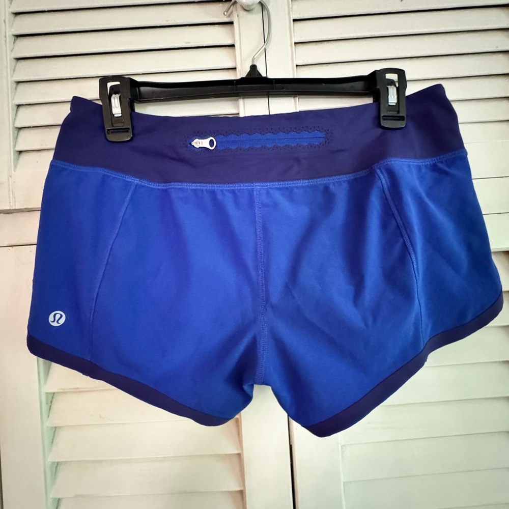 Lululemon vintage style running shorts two-toned blue size 4 EUC unique zipper